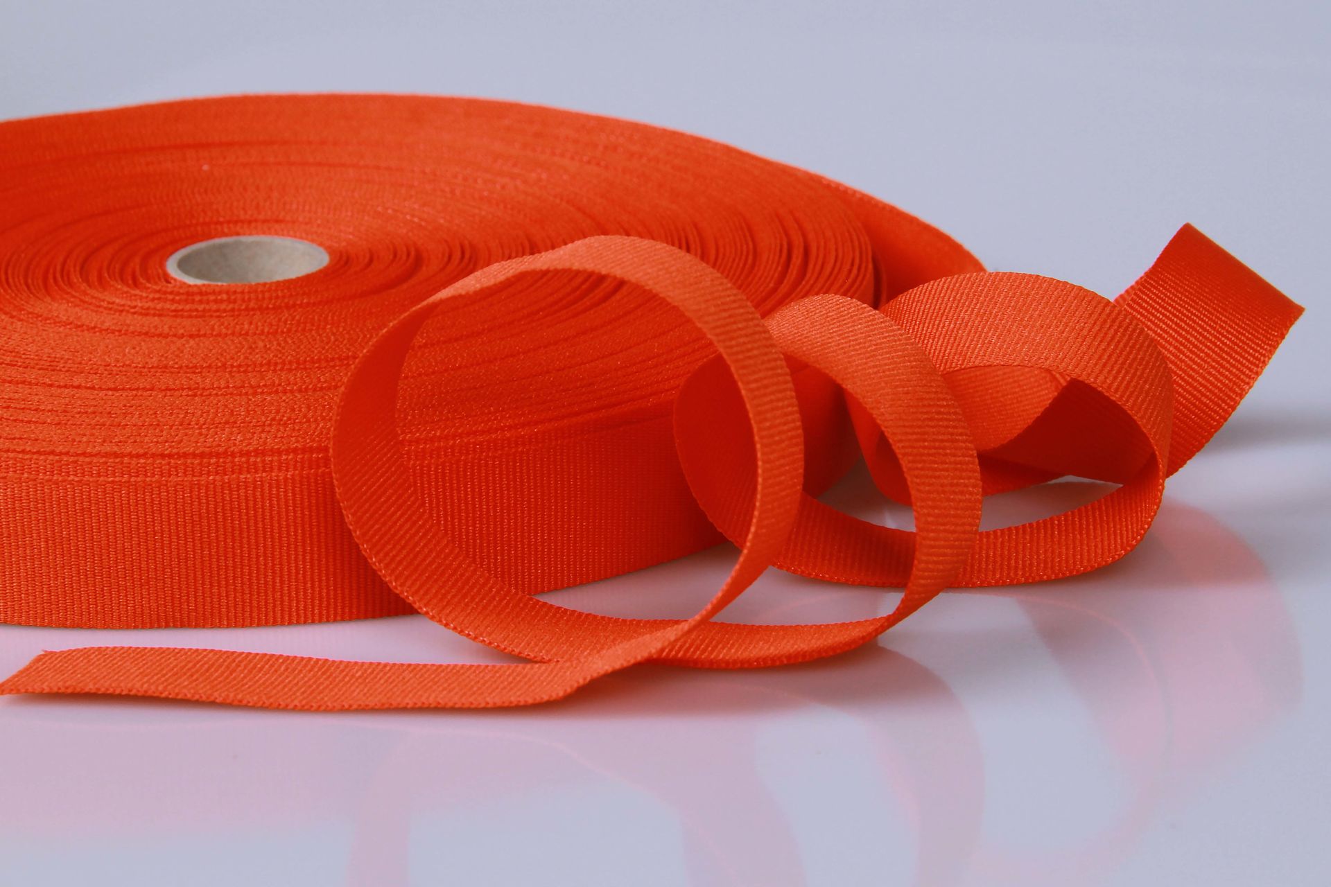 PES-Ripsband  -  25 mm breit  -  50 mtr. Rolle  -  orange  -  soft/weich